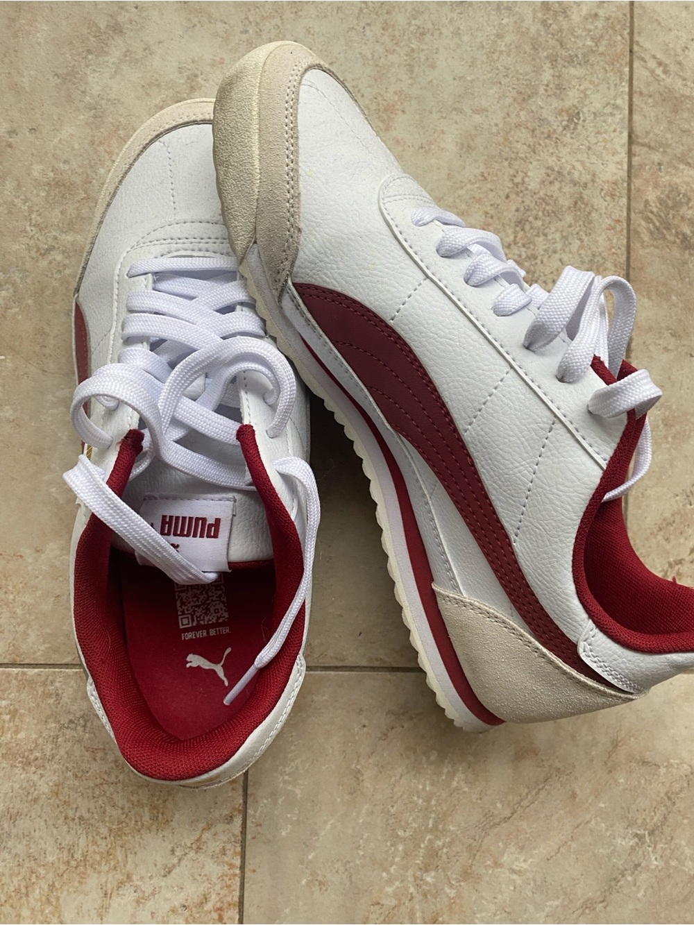 Women’s red and white leather Puma shoe size 8